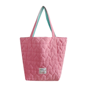Pink heart quilted tote bag with contrast cyan handles and hope letter patch
