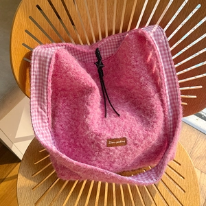 Pink plush crossbody bag with cozy lamb wool texture and stylish gingham lining