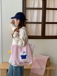 Pink canvas tote bag featuring cute cartoon bear embroidery and spacious shoulder design