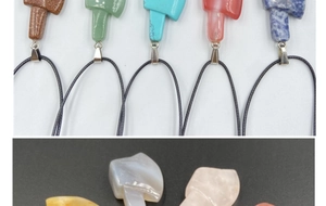 Detailed collection of axe-shaped gemstone pendants with assorted natural stone textures