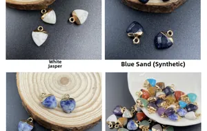 Detailed view of heart-shaped semi-precious stone pendants with gold plated metal caps