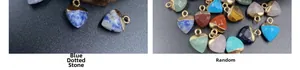 Detailed view of heart-shaped semi-precious gemstone pendants with gold metal bails