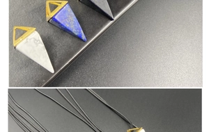 Detailed view of geometric pyramid stone pendants with elegant gold metal clips