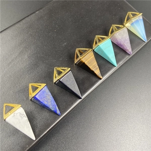 Set of seven geometric hexagonal pyramid crystal pendants with gold metal caps