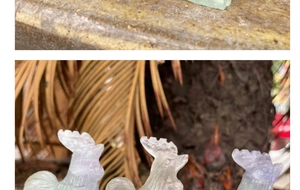 Detailed view of hand-carved natural green fluorite rooster figurine showing stone texture