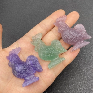 Hand-carved natural fluorite rooster figurines in purple and green crystal stones