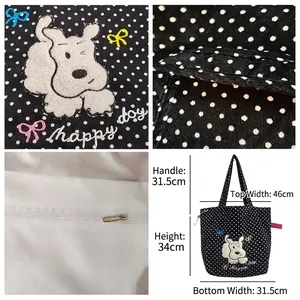 Black polka dot canvas tote bag with cartoon dog embroidery and large capacity interior