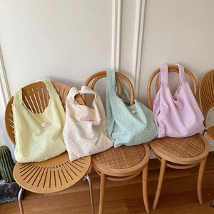 Chic textured bubble crepe tote bags in pastel yellow, beige, mint, and purple colors