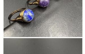 Detailed close-up of handmade wire-wrapped ring featuring lapis lazuli and amethyst stones