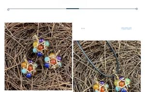 Detailed shot of wire-wrapped seven-color natural stone hexagram pendant with wax cord