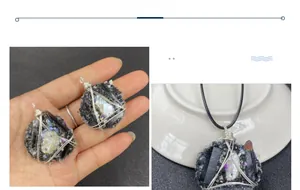 Détail du pendentif artisanal en cristal noir avec fil d'argent et touches violettes