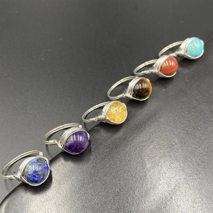 Set of six handmade wire wrapped rings with natural amethyst and lapis lazuli stones