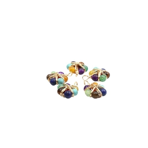 Set of five handmade natural stone wire wrapped star pendants with amethyst and colorful gems