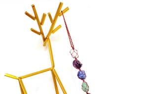 Handmade chakra healing crystal hanging ornament with natural raw stones in red net bag