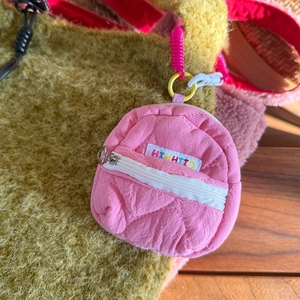 Pink quilted mini backpack coin purse with letter embroidery and spiral keyring