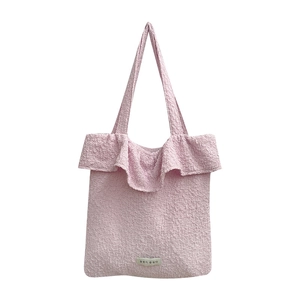 Pink ruffle shoulder bag with bubble texture and stylish Korean label design