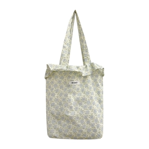 Fresh light blue floral tote bag with ruffle trim and Bisket brand label for women