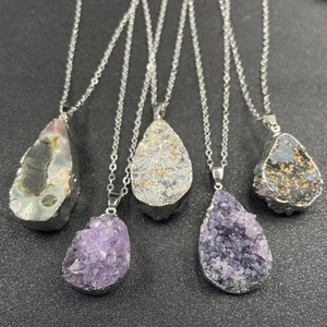 Natural amethyst crystal geode teardrop pendants with silver plated edges on thin chains