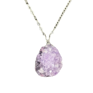 Natural amethyst crystal cluster pendant necklace with silver-plated chain on white background