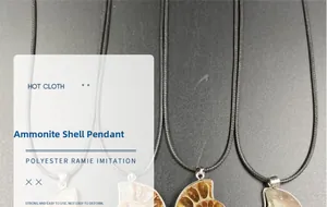 Macro shot of multiple natural ammonite fossil shell pendants with black woven cords