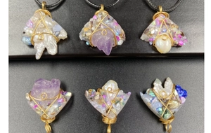 Handcrafted amethyst and pearl wire wrapped pendants in bohemian gold wire style