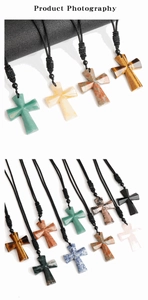 Detailed collection of cross necklaces made from natural stones and braided cords