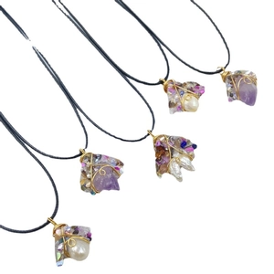 Handmade amethyst and pearl wire wrapped pendants on black cord necklaces