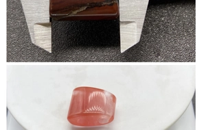 Macro shot measuring the thickness of a red agate fan pendant with a digital caliper