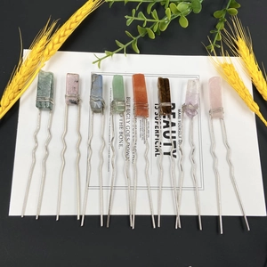 U-shaped hairpins with irregular natural stones and wire wrapping on white card