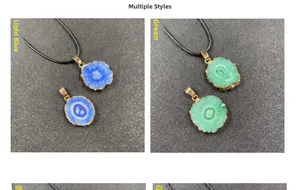 Detailed close-up of colorful irregular agate slice pendants with gold plated edges