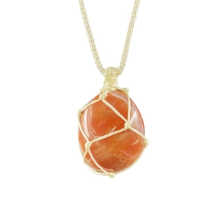 Handmade mesh net necklace featuring raw red agate stone pendant with woven cord