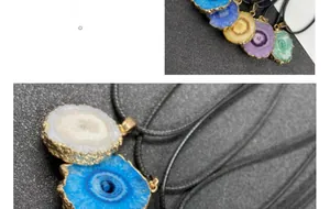 Macro detail of colorful agate slice pendants with gold plated edges on black cords