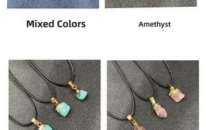 Detailed view of turquoise and amethyst raw stone pendants with black cord necklace straps