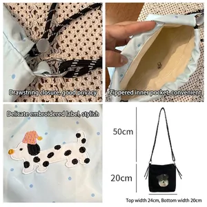 Sac bandoulière en toile avec broderie de chien et fermeture à cordon réglable