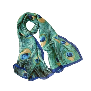 Elegant silk-like satin scarf with vibrant peacock feather pattern on a white background