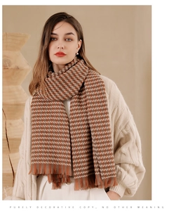 Detail of plaid cashmere-feel scarf featuring fringe edges and fine woven geometric pattern