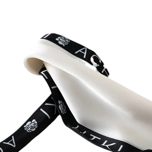 Elegant retro silk scarf with black and white rose pattern and artistic lettering