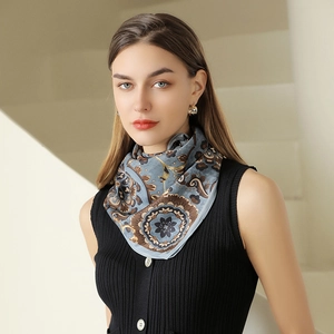 Elegant 90cm square silk scarf featuring grey-blue vintage floral patterns on a model