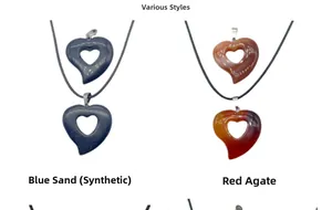 Close-up of Blue Goldstone and Red Agate hollow heart-shaped pendant necklaces