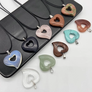 Assorted heart-shaped natural stone and crystal pendants with silver metal clasps
