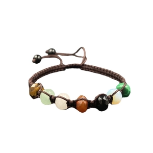 Handmade bohemian braided rope bracelet featuring seven colorful natural crystal stones