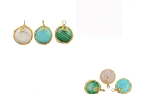 Detail of round semi-precious stone pendants with handmade gold wire wrapping texture