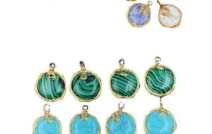 Macro view of wire-wrapped semi-precious stone pendants in various textures and colors