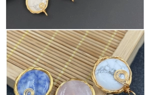 Handcrafted round wire wrapped semi-precious stone pendants in gold finish detail