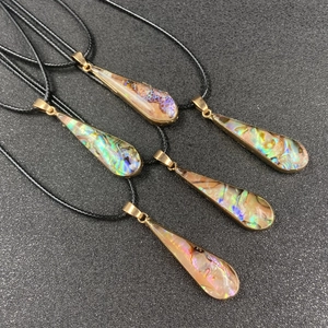 Teardrop necklace with iridescent abalone shell pendant and gold trim on black cord