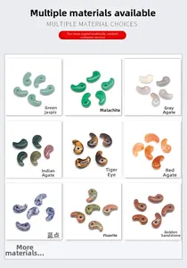 Detailed grid of nine assorted natural stone and agate magatama beads for jewelry