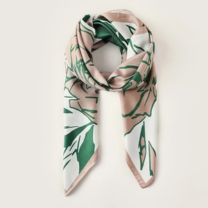 Elegant floral faux silk scarf featuring abstract botanical prints in green and pink