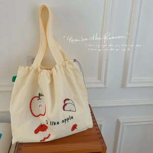 Canvas drawstring tote bag with apple embroidery and letter print for daily use