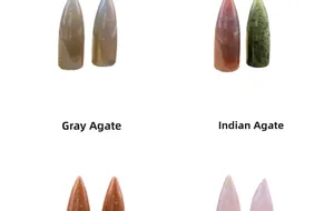 Close-up of polished bullet-shaped crystal pendants in grey and Indian agate