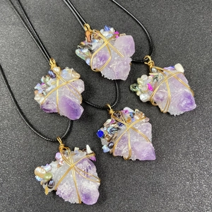 Five-piece set of amethyst crystal geode pendants with gold wire wrapping and pearl accents